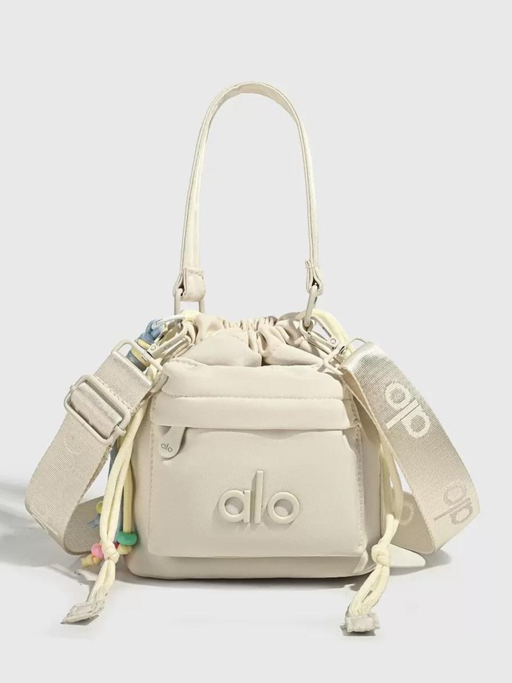 ALO Yoga Cream Drawstring Crossbody Mini Tote